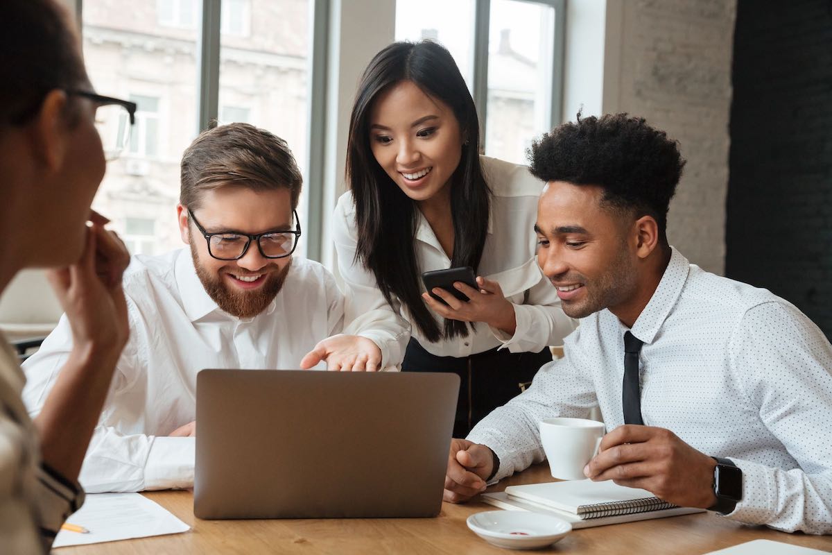 Creative web design team working in office environment